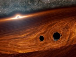 Astrónomos observan un raro evento de fusión de tres agujeros negros supermasivos
