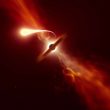 Astrónomos captan una estrella cercana siendo devorada por un agujero negro