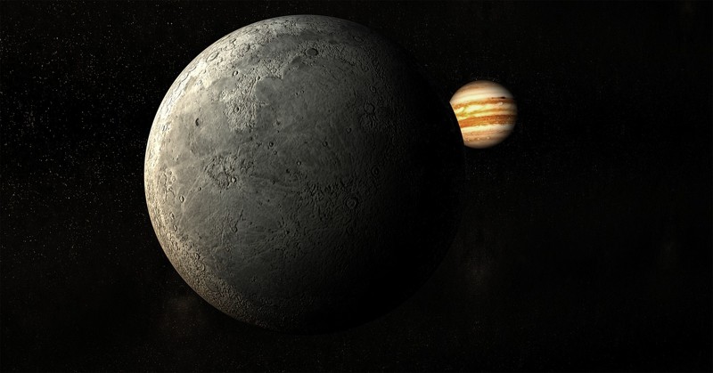 Representación de Júpiter y una de sus lunas